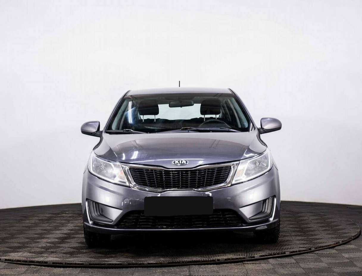 Kia Rio с пробегом — 2013 год. Фото: #1