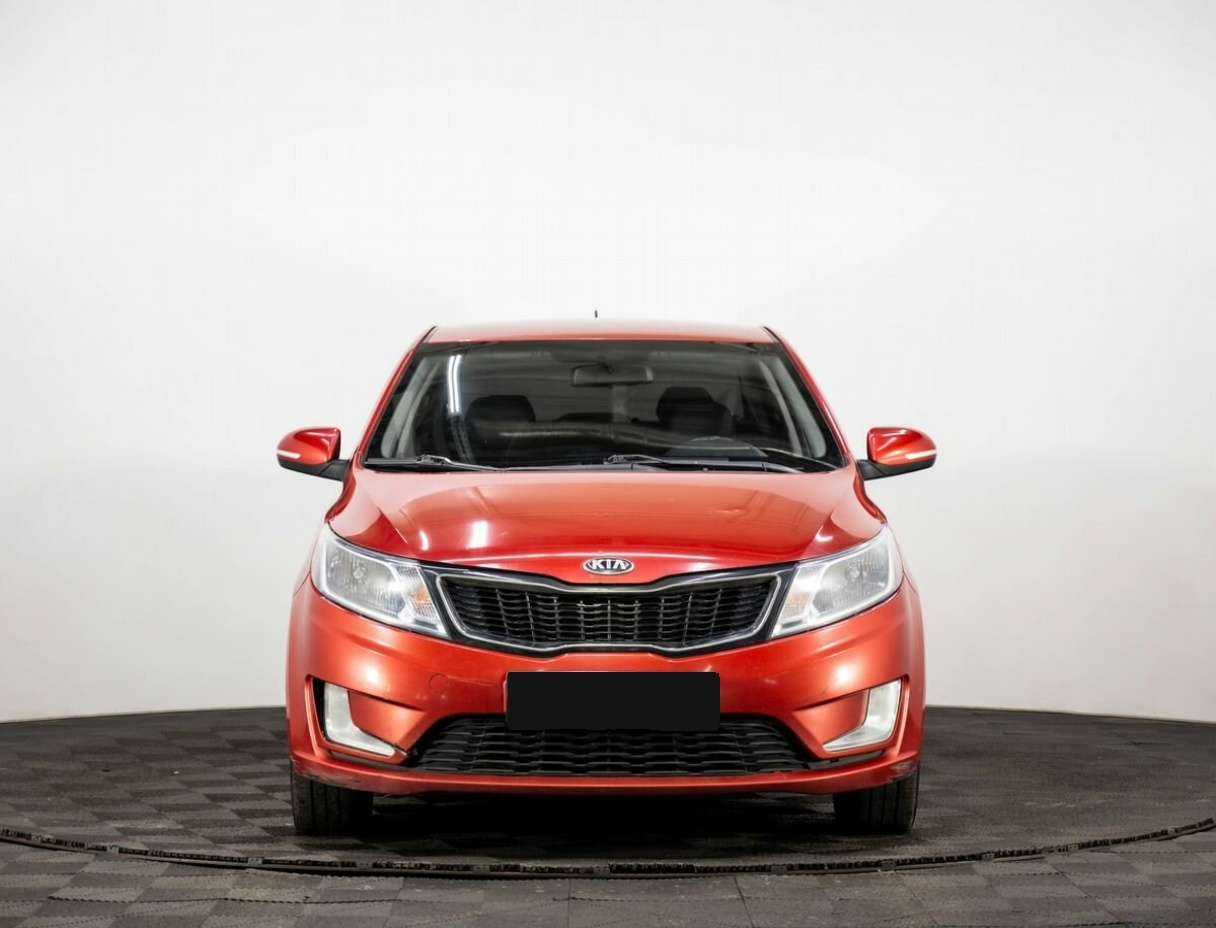 Kia Rio с пробегом — 2013 год. Фото: #1