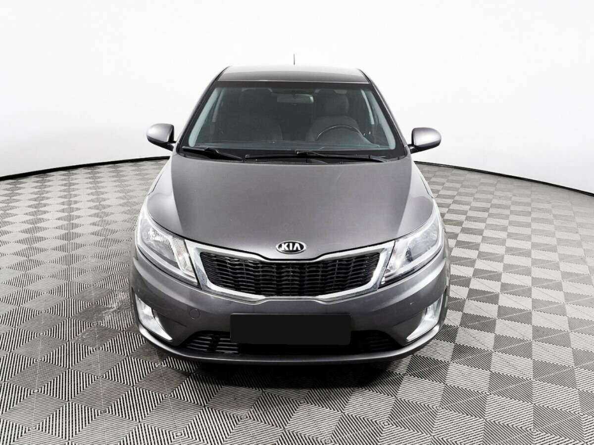 Kia Rio с пробегом — 2014 год. Фото: #1
