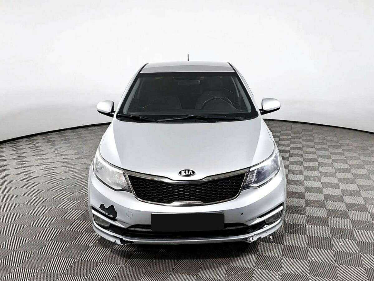 Kia Rio с пробегом — 2015 год. Фото: #1