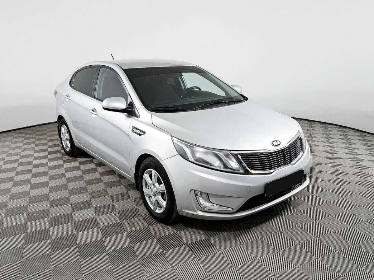 Kia Rio с пробегом — 2015 год. Фото: #1