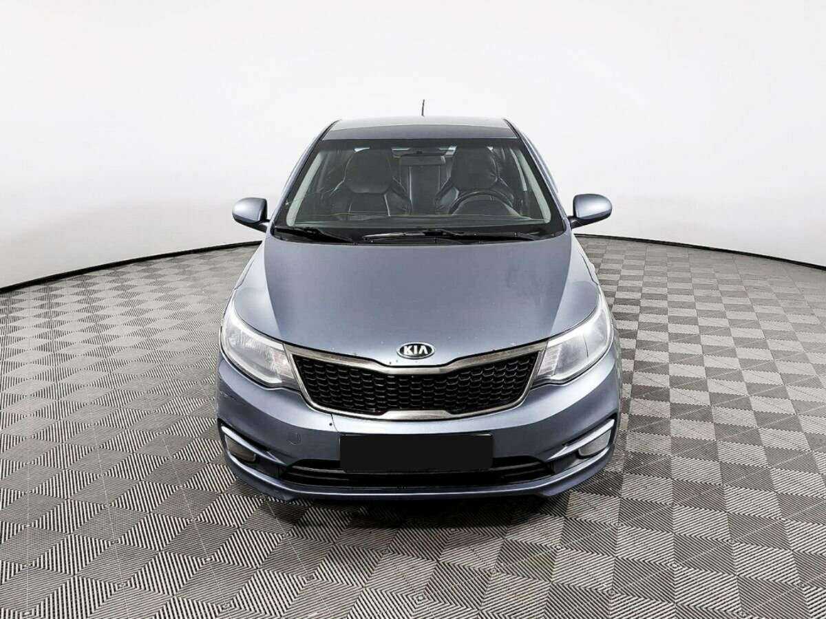 Kia Rio с пробегом — 2015 год. Фото: #1