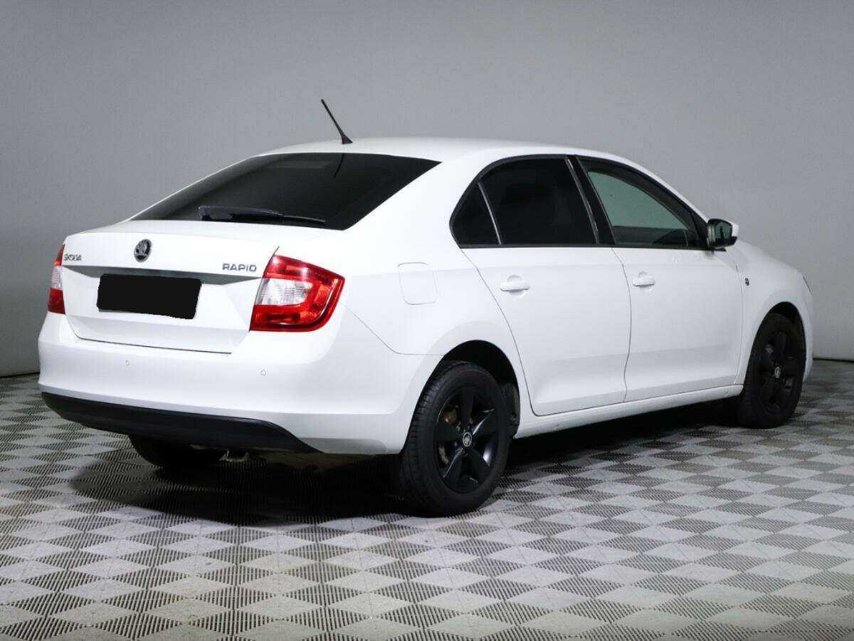 Skoda Rapid с пробегом — 2014 год. Фото: #4