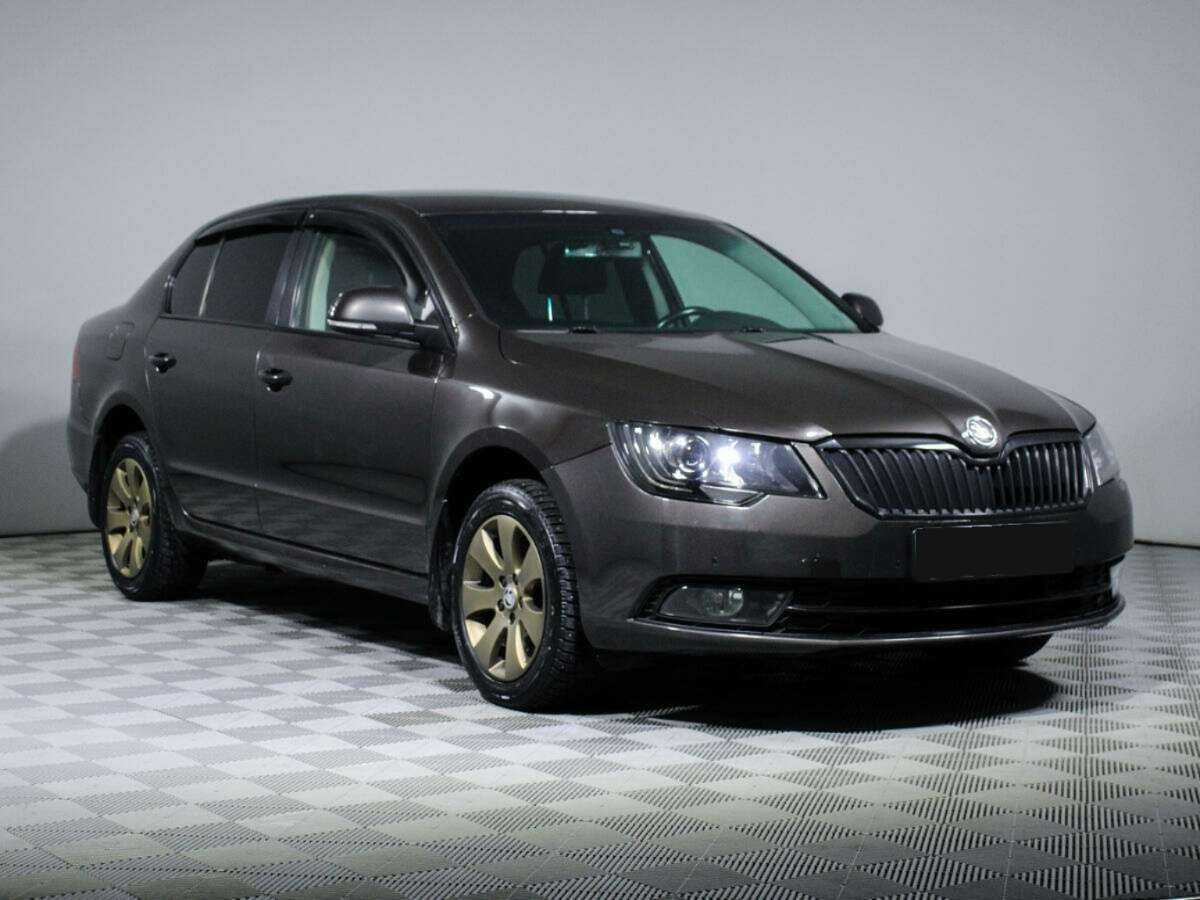 Skoda Superb с пробегом — 2014 год. Фото: #2