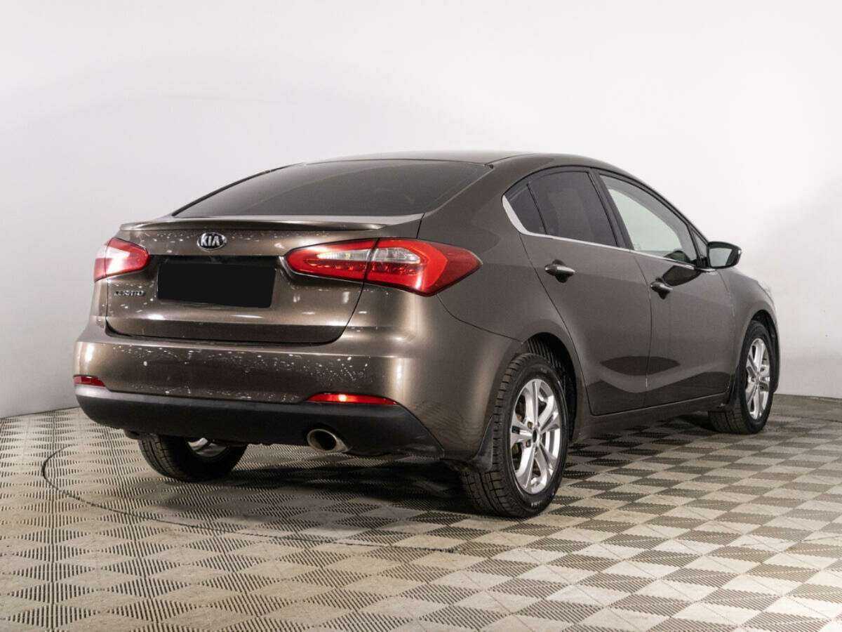 Kia Cerato с пробегом — 2014 год. Фото: #4
