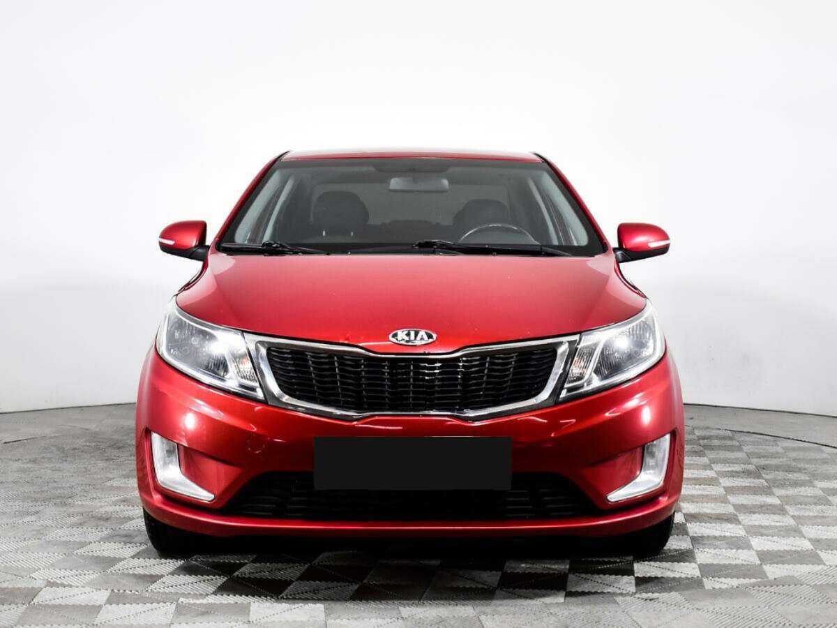 Kia Rio с пробегом — 2013 год. Фото: #1