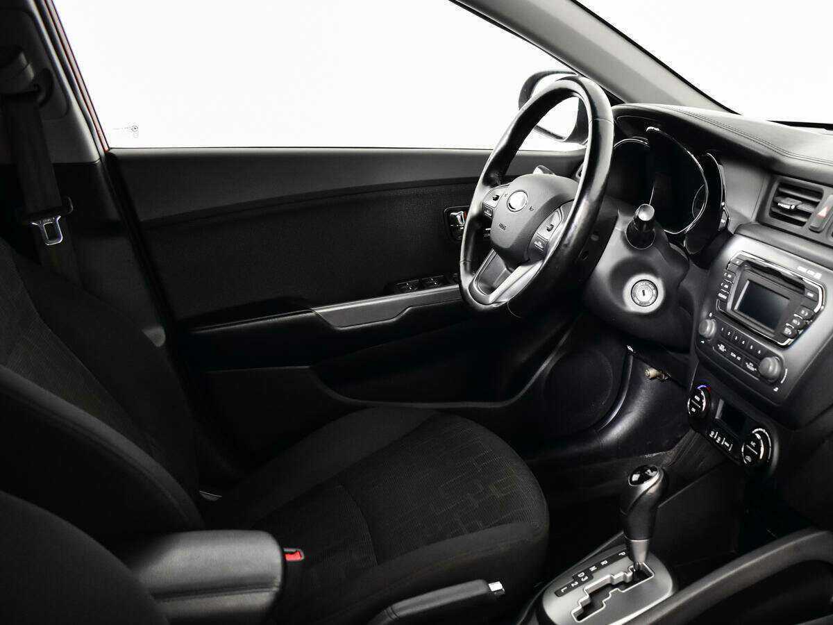 Kia Rio с пробегом — 2013 год. Фото: #6