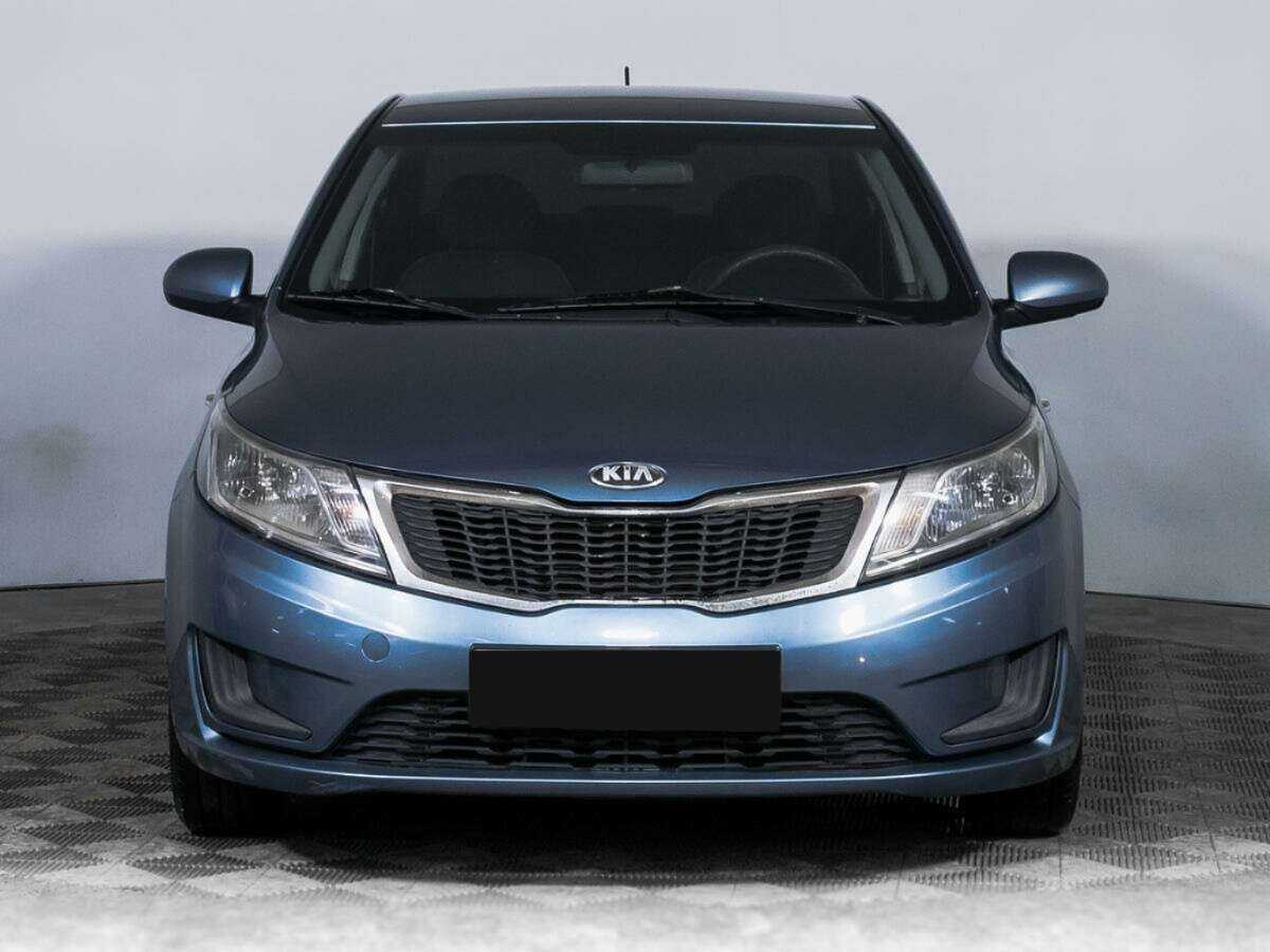 Kia Rio с пробегом — 2013 год. Фото: #1