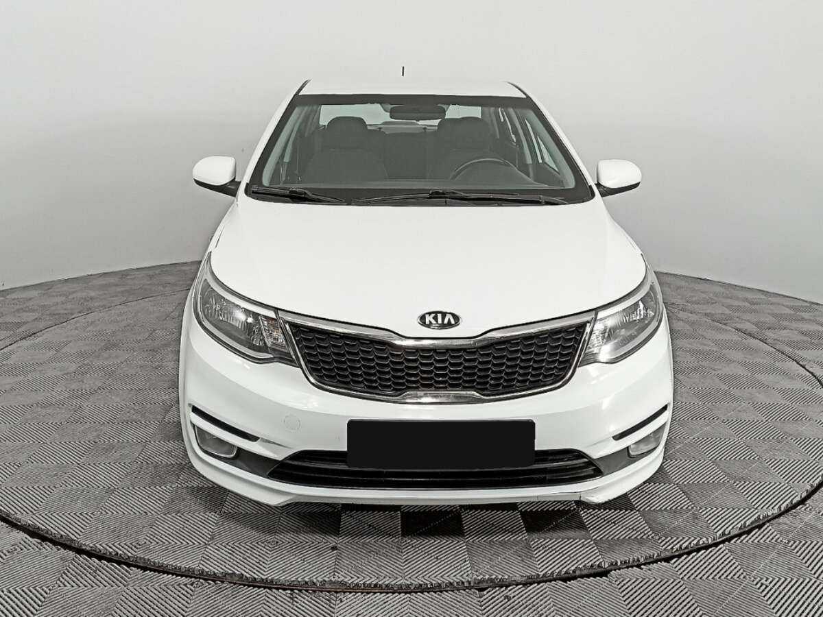 Kia Rio с пробегом — 2015 год. Фото: #1