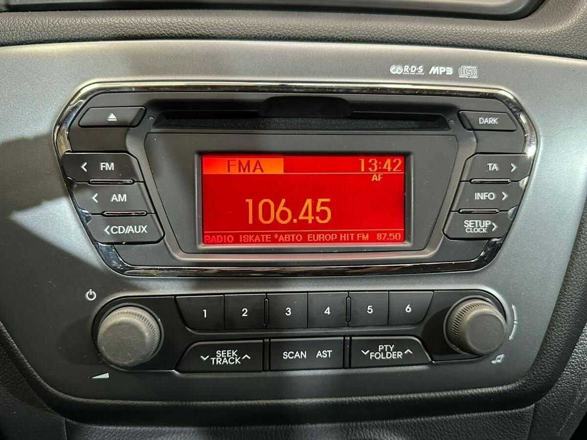 Kia Rio с пробегом — 2014 год. Фото: #13