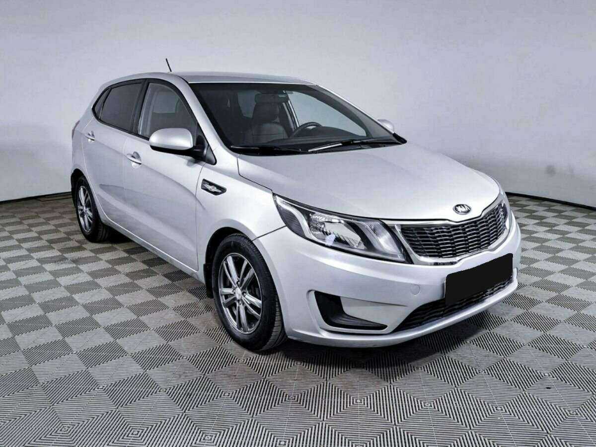 Kia Rio с пробегом — 2013 год. Фото: #2