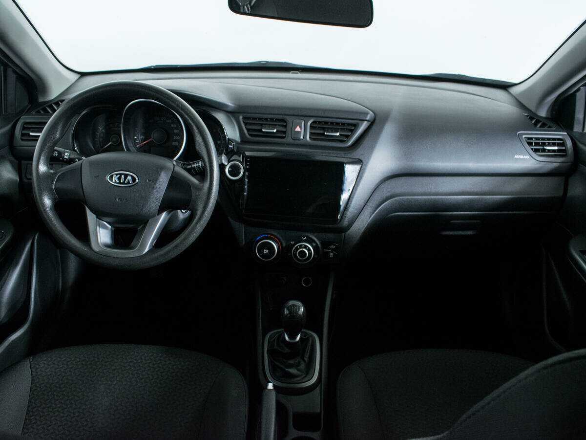 Kia Rio с пробегом — 2012 год. Фото: #11