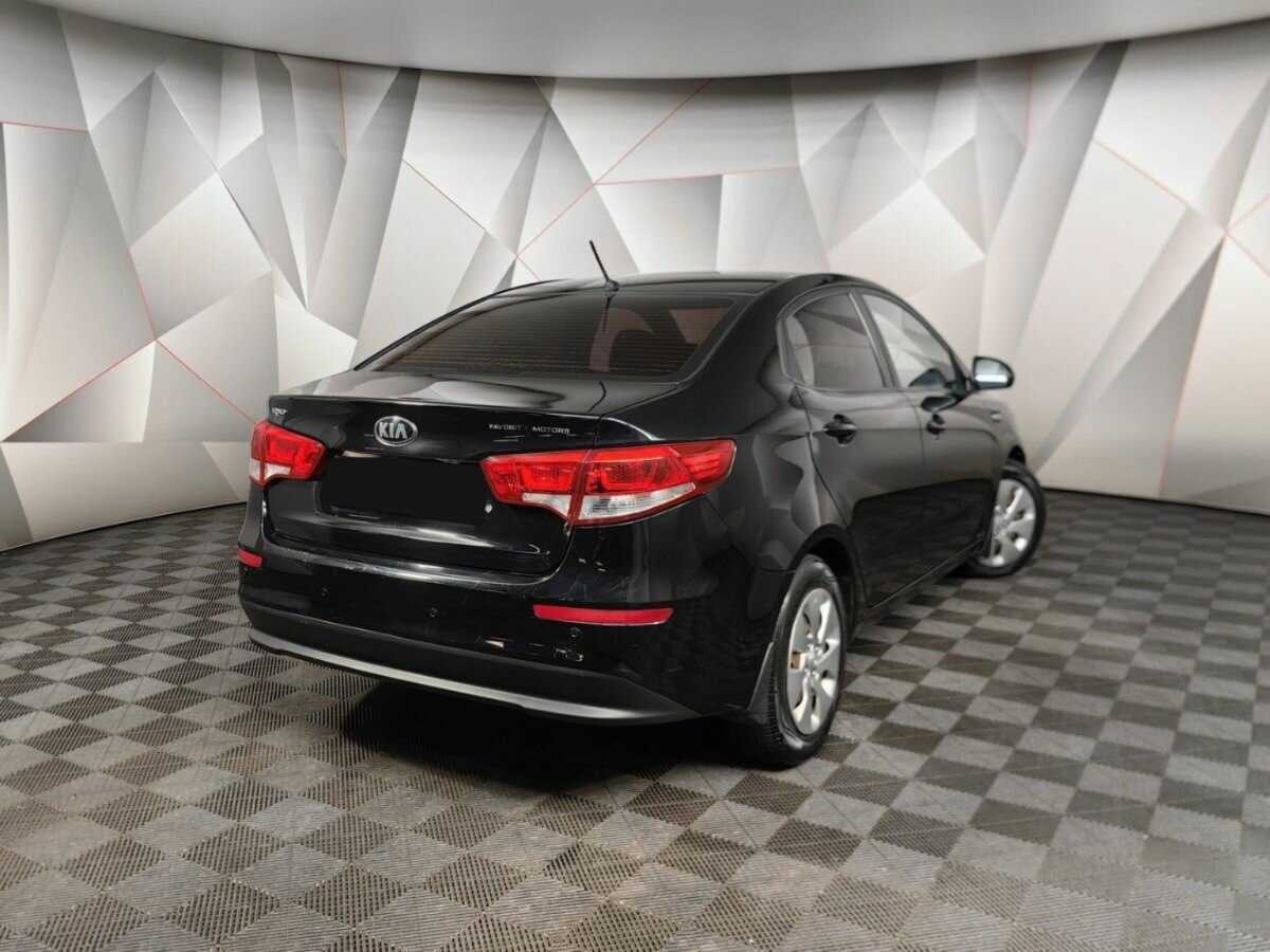 Kia Rio с пробегом — 2015 год. Фото: #1