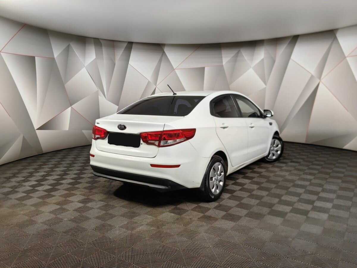 Kia Rio с пробегом — 2015 год. Фото: #1