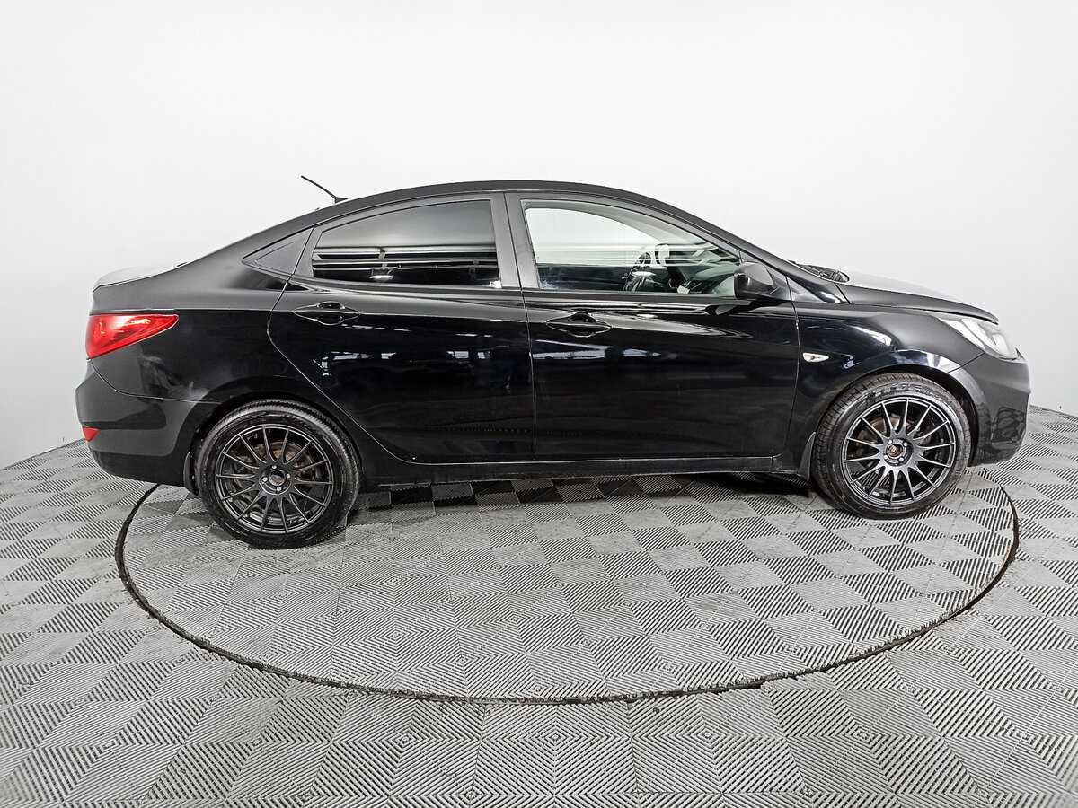 Hyundai Solaris с пробегом — 2013 год. Фото: #3