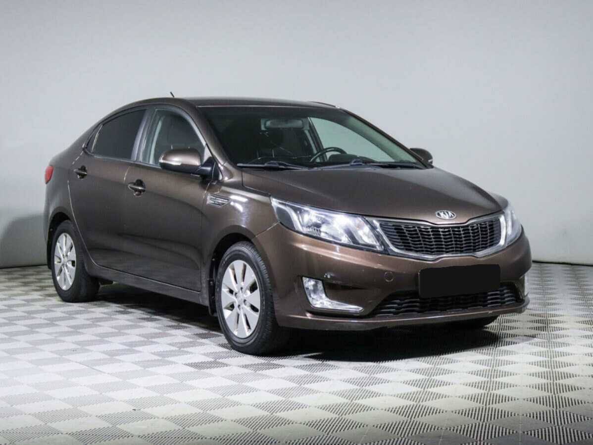 Kia Rio с пробегом — 2014 год. Фото: #2
