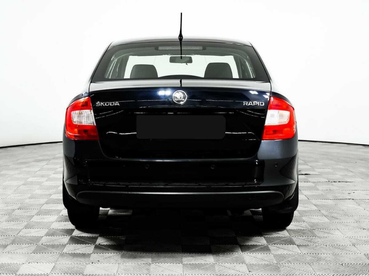 Skoda Rapid с пробегом — 2014 год. Фото: #5