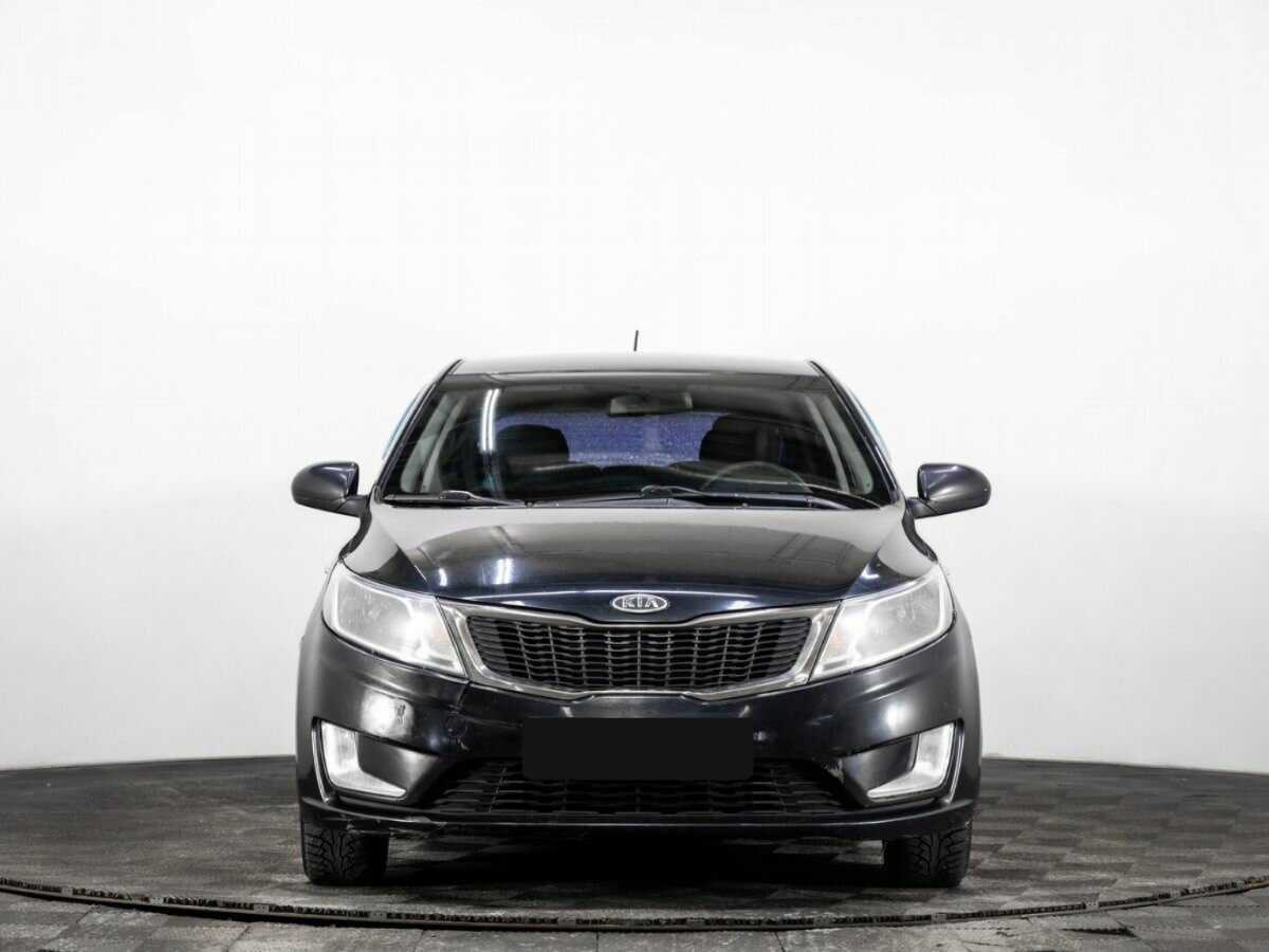 Kia Rio с пробегом — 2012 год. Фото: #1