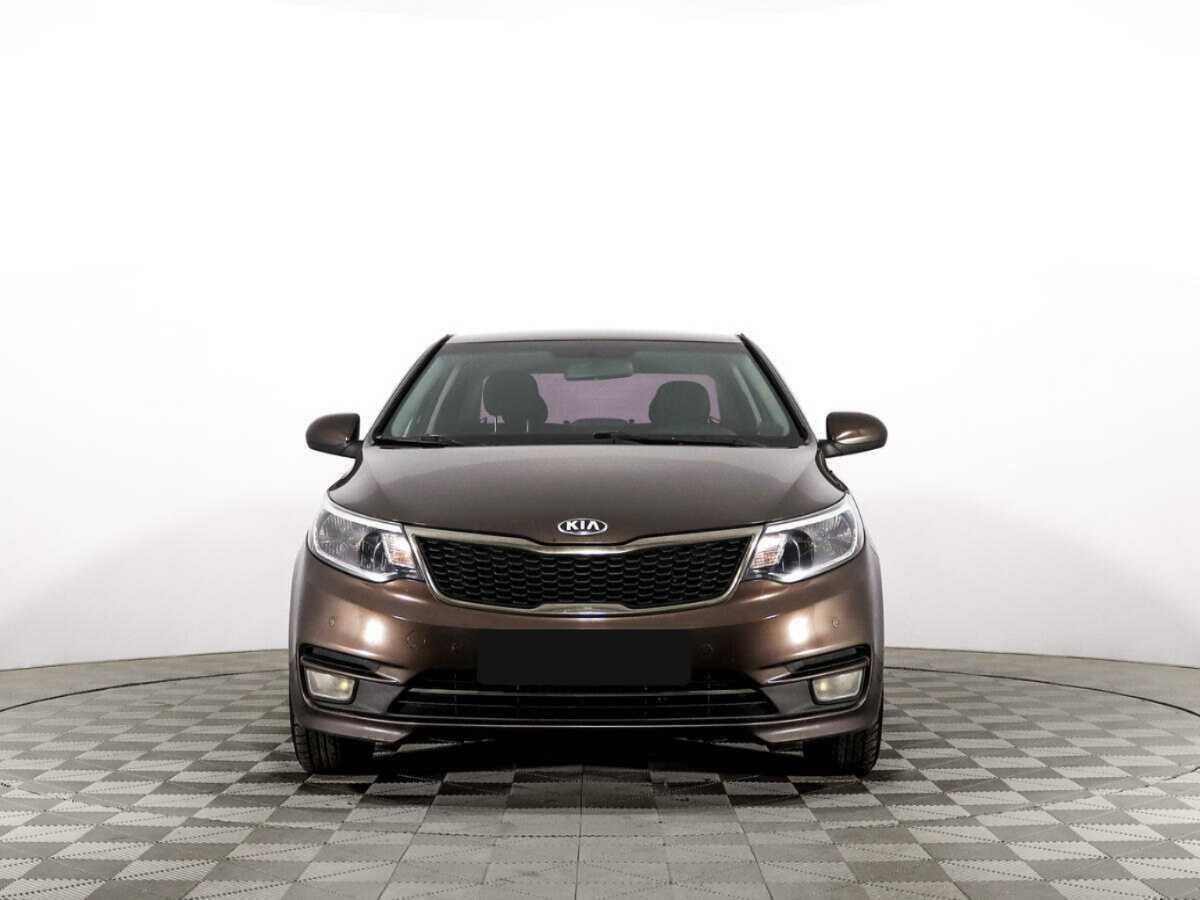 Kia Rio с пробегом — 2015 год. Фото: #1