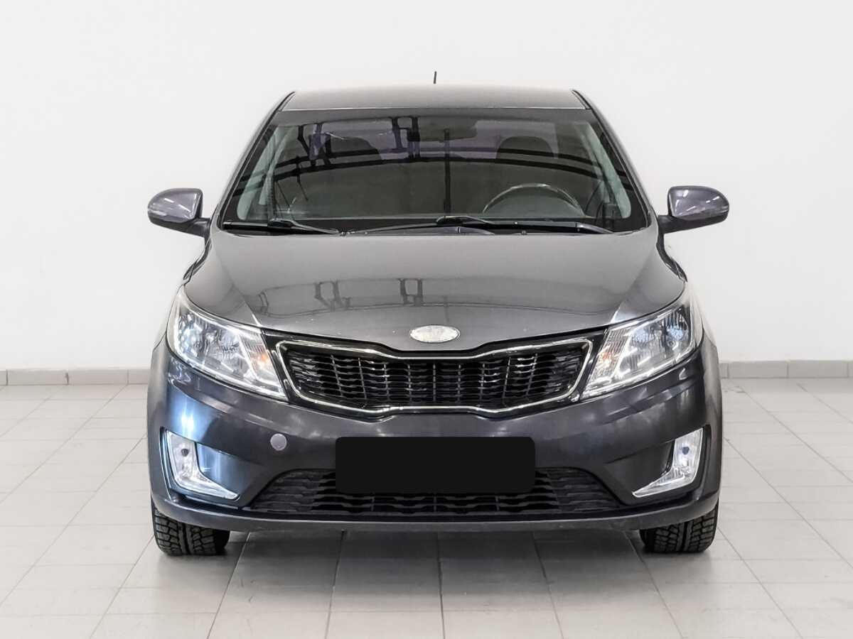 Kia Rio с пробегом — 2014 год. Фото: #1