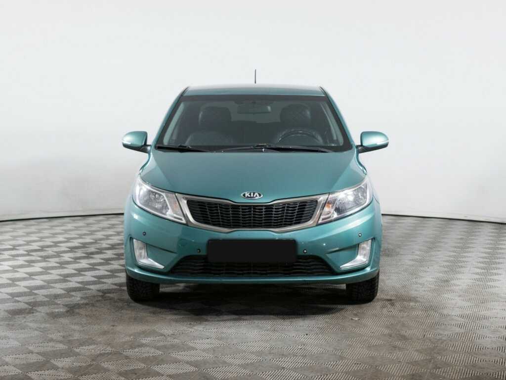 Kia Rio с пробегом — 2013 год. Фото: #1