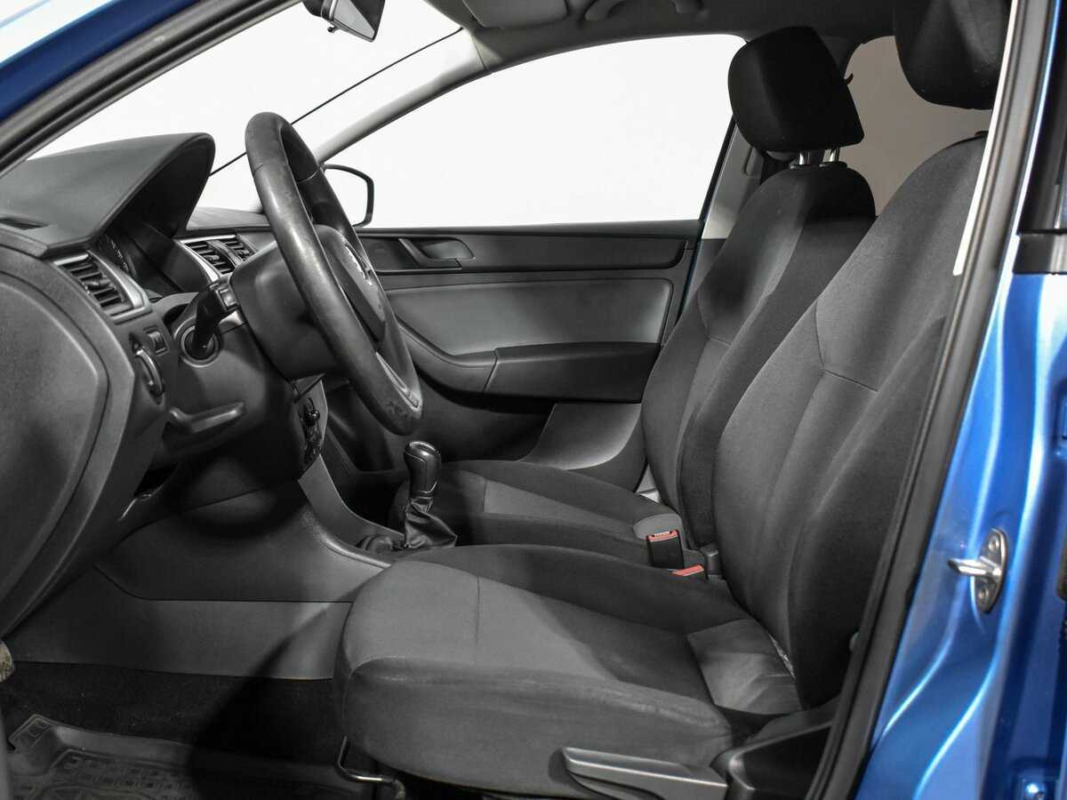 Skoda Rapid с пробегом — 2014 год. Фото: #10