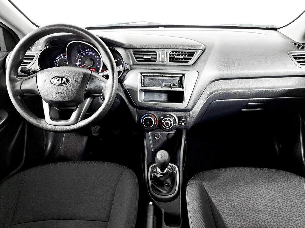 Kia Rio с пробегом — 2013 год. Фото: #11