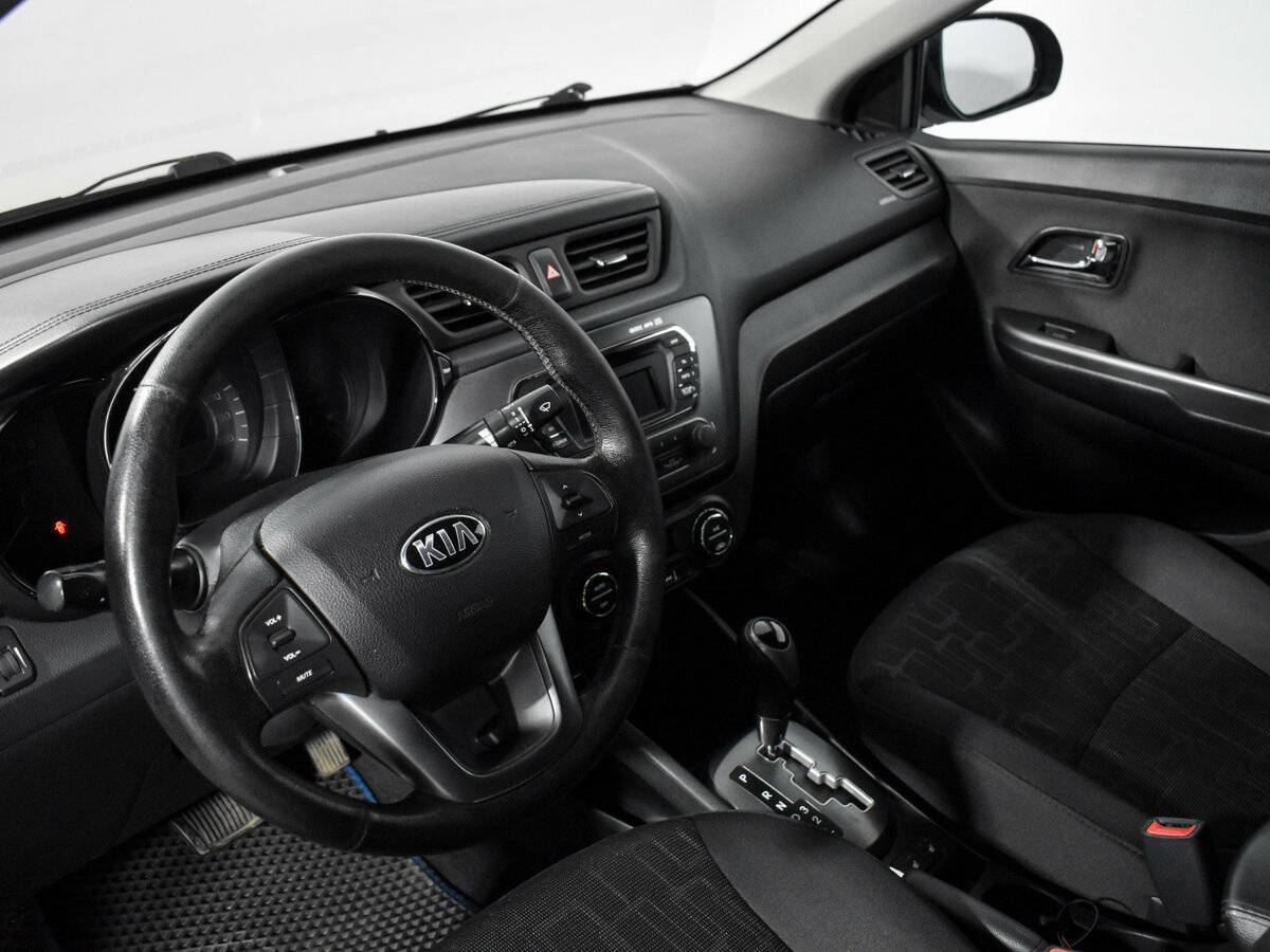 Kia Rio с пробегом — 2013 год. Фото: #8