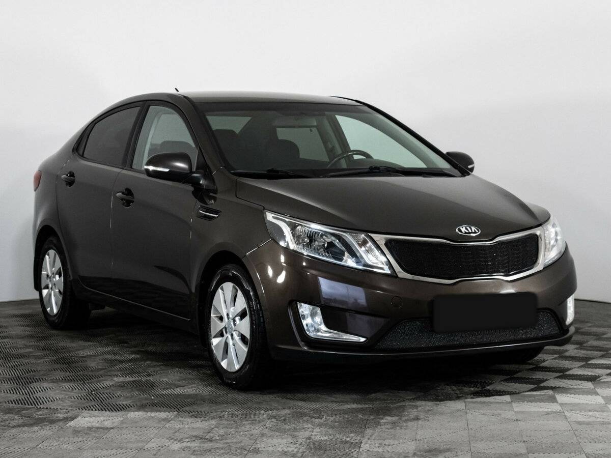 Kia Rio с пробегом — 2014 год. Фото: #2