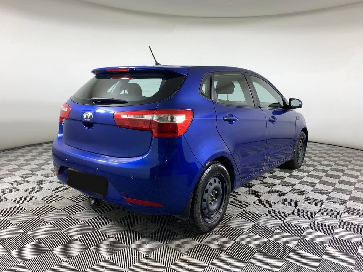 Kia Rio с пробегом — 2013 год. Фото: #4