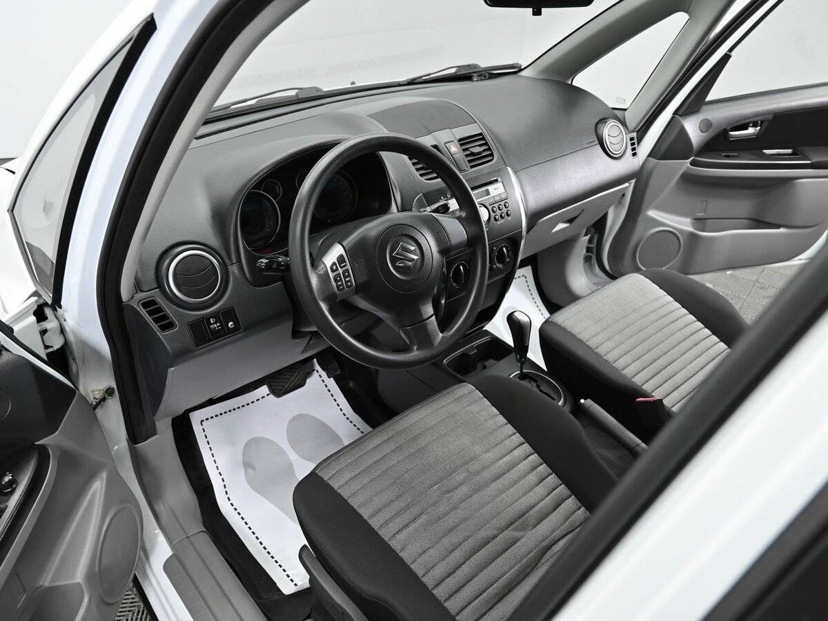 Suzuki SX4 с пробегом — 2013 год. Фото: #7